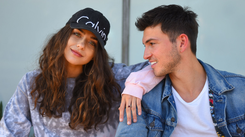 Victoria Konefal and Robert Scott Wilson pose for a photo. 