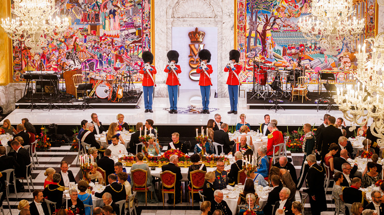 Guests enjoy a royal ball at Christiansborg Palace in Denmark