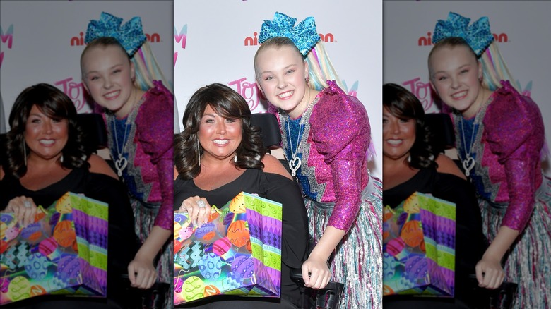 JoJo Siwa posing with Abby Lee Miller