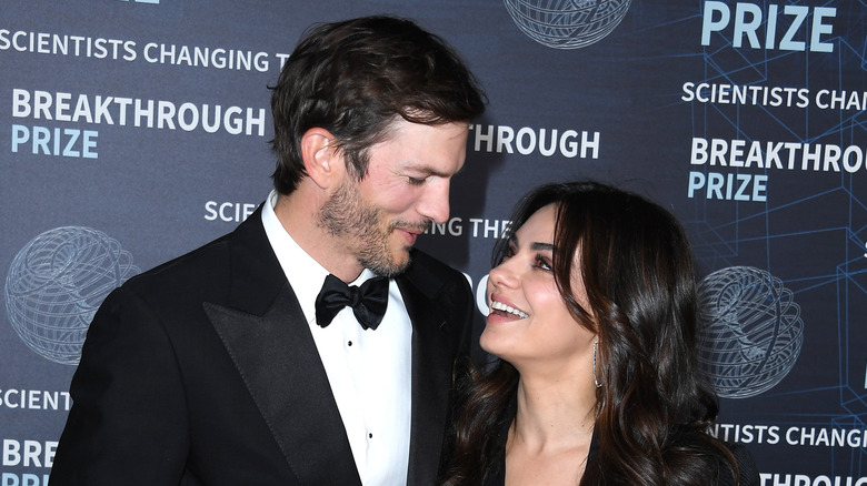 Mila Kunis and Ashton Kutcher at red carpet event