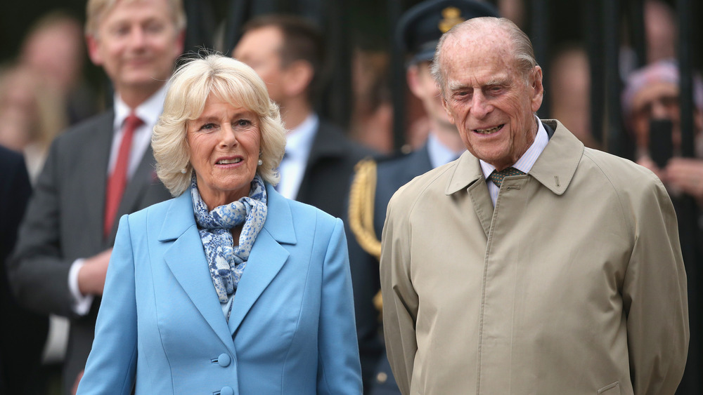 Camilla walking with Prince Philip