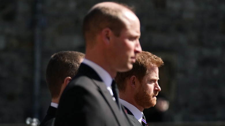 Prince William and Prince Philip standing next to each other at Prince Philip's funeral