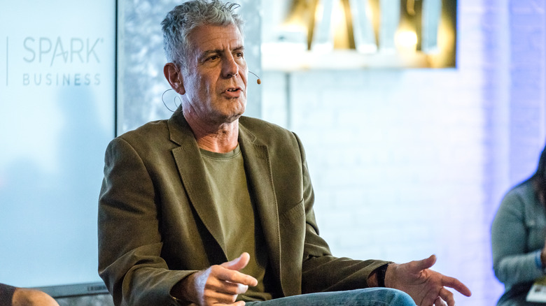 Anthony Bourdain speaks at a panel.