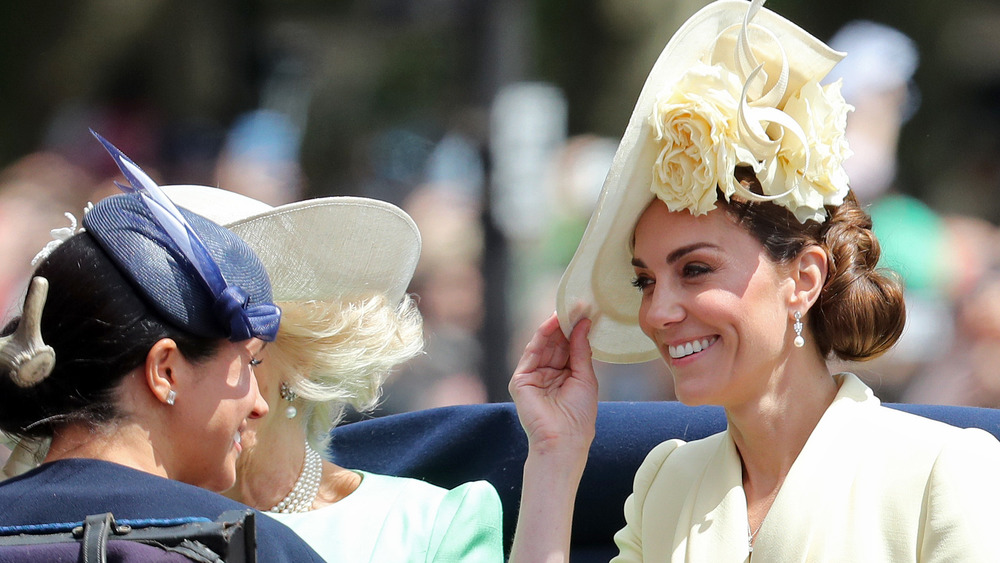 Meghan Markle, Kate Middleton wearing hats