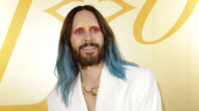 Jared Leto wearing pink eye makeup 