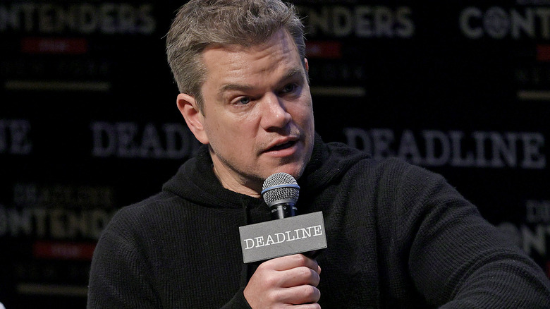 Matt Damon speaking on stage 