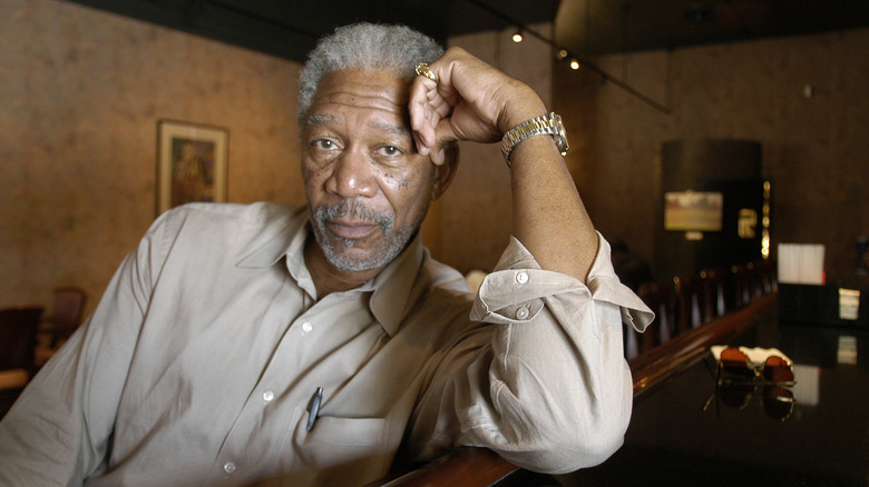 Morgan Freeman rests his head on his hand