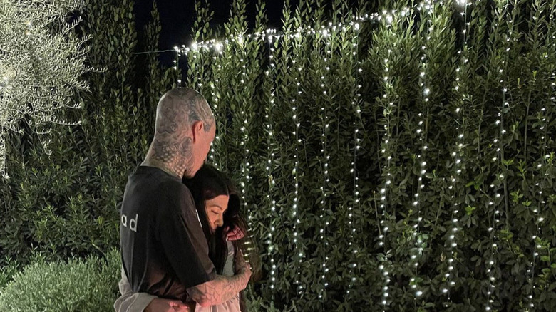 Kourtney Kardashian, Travis Barker hugging