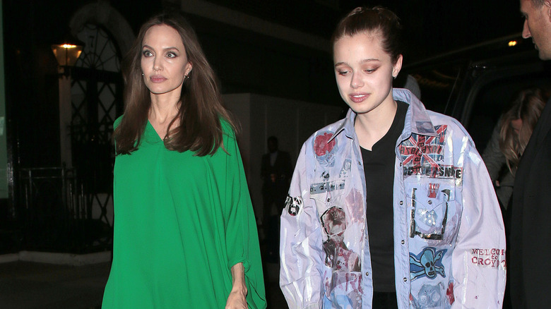 Shiloh Jolie-Pitt walking with her mom Angelina Jolie