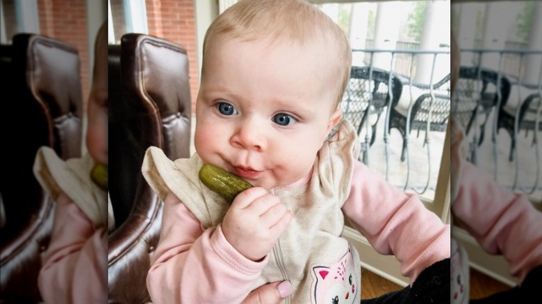 Baby Evelyn Forsyth with pickle