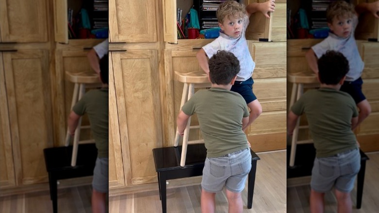 Spurgeon, Henry Seewald climbing chairs