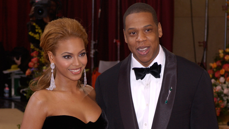 Jay-Z and Beyoncé posing at an event