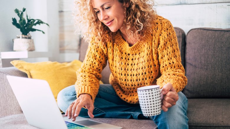 Charming woman reading headlines