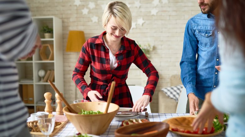 Women helping prepare for a party