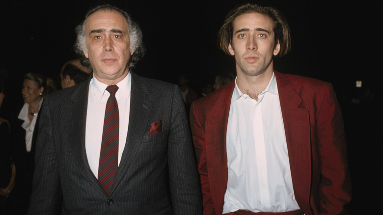 Nicolas Cage and his father August Coppola attending the premiere of "Moonstruck" in 1988