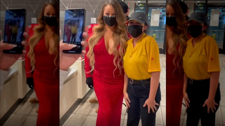 Mariah Carey wearing mask, red dress