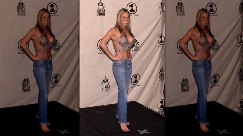 Mariah Carey posing in jeans