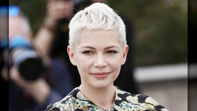 Michelle Williams with a very short platinum blonde pixie cut in 2017