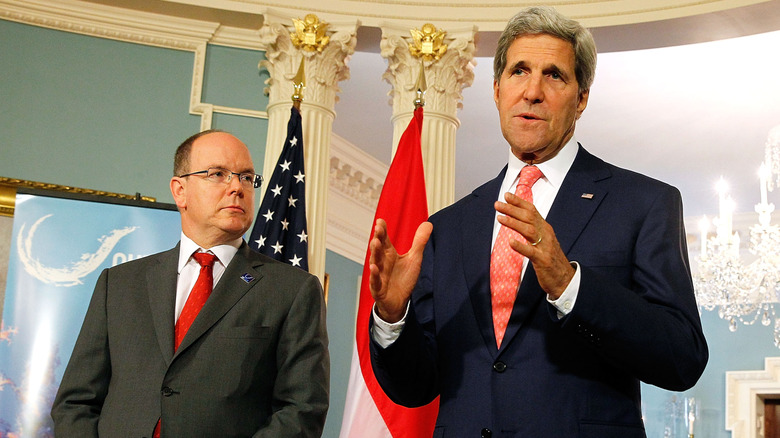 Prince Albert looking at John Kerry during speech