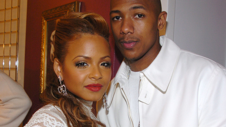 Nick Cannon Christina Milian staring ahead