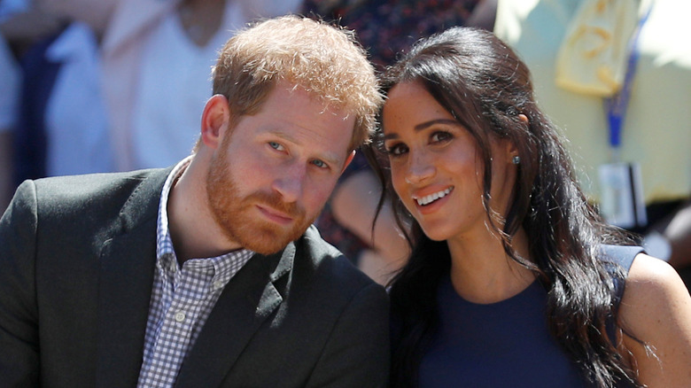 Prince Harry and Meghan Markle put their heads together