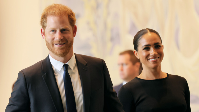 Prince Harry and Meghan Markle smiling at UN HQ