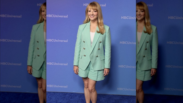 Melissa Rauch in a pastel teal suit with shorts