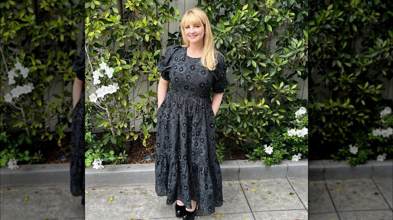 Melissa Rauch wearing a black maxi dress with pockets