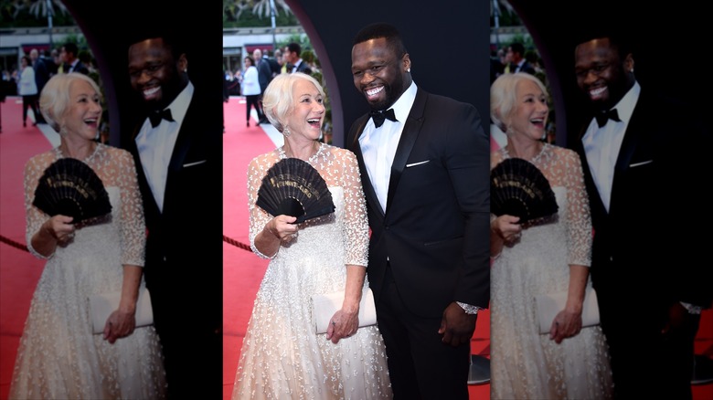 Helen Mirren and 50 Cent laughing