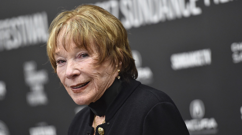 Shirley MacLaine poses on the red carpet