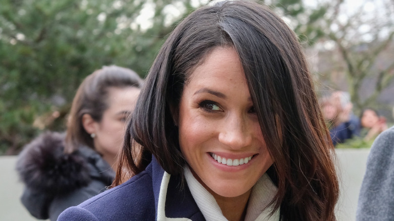 Meghan Markle smiling.