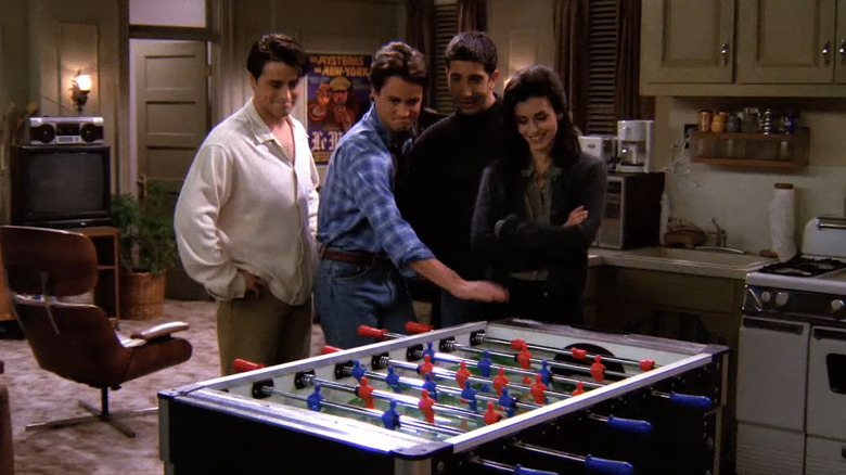 Joey, Chandler, Ross, Monica at foosball table