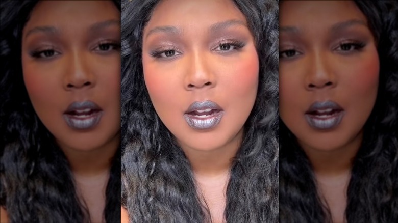 Lizzo with metallic frosted lipstick