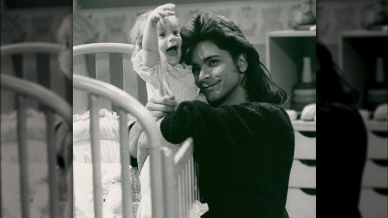 John Stamos on Full House couch