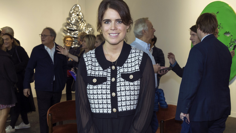 Princess Eugenie smiles at camera