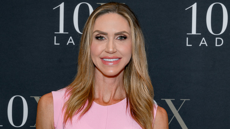 Lara Trump smiling in a pink dress at the 10X Ladies Conference Miami 2024 at JW Marriott Miami Turnberry Resort & Spa on August 16, 2024 in Aventura, Florida