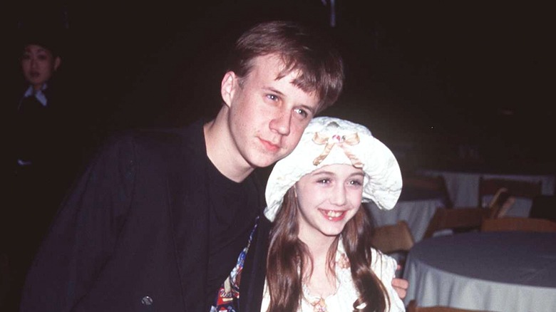 Benjamin Salisbury posing with Madeline Zima