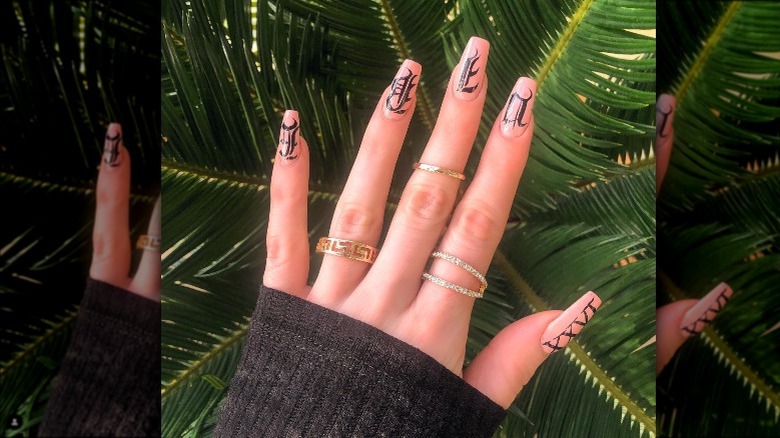 Roman numeral and lettered nail art 