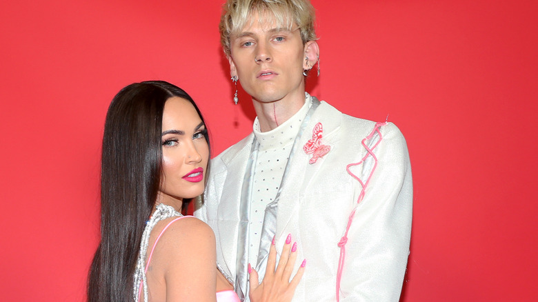 Machine Gun Kelly and Megan Fox posing 