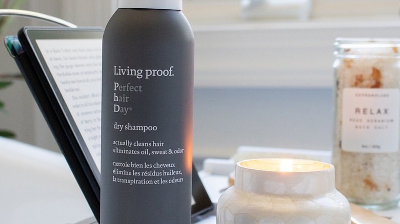 A bottle of Living Proof dry shampoo on a counter