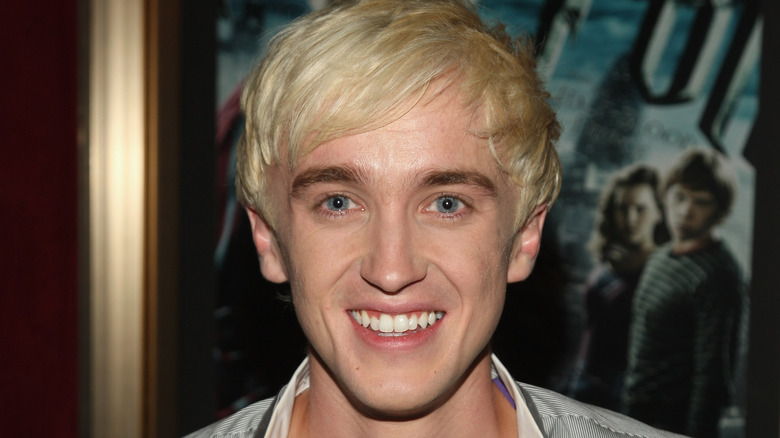 Harry Potter star Tom Felton poses for a photo 