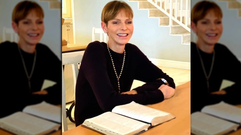 Princess Charlene sitting and smiling