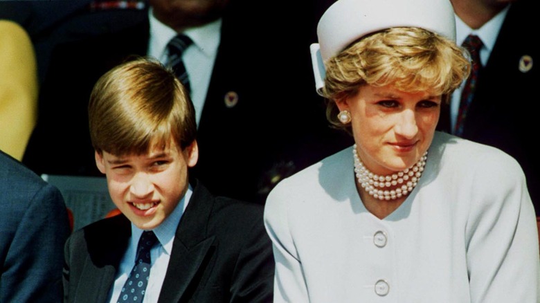 Prince William sitting with Diana Spencer 