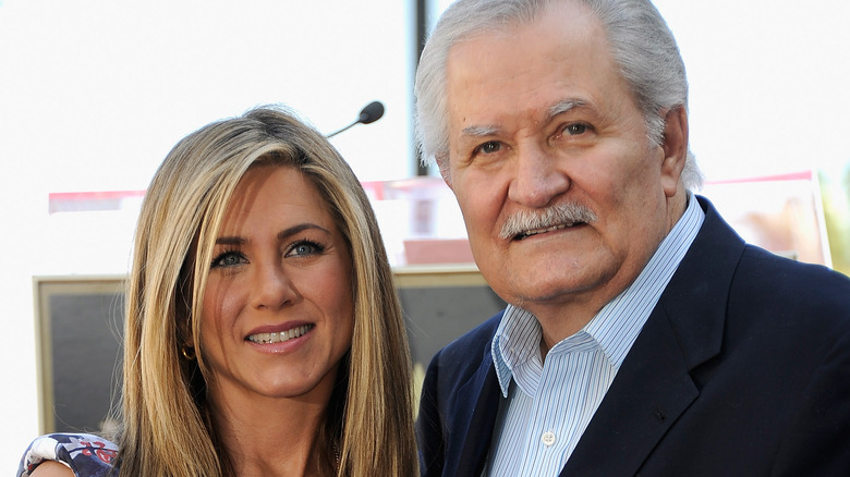 Jennifer and John Aniston attend an event