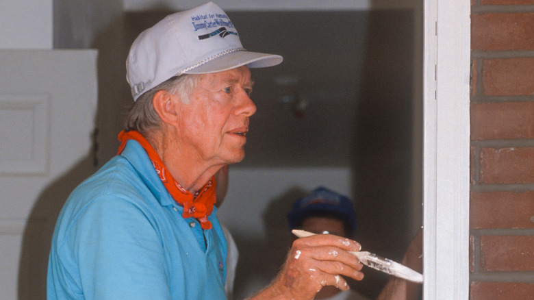 Jimmy Carter painting with Habitat for Humanity