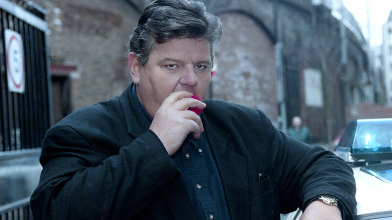 Robbie Coltrane looking serious