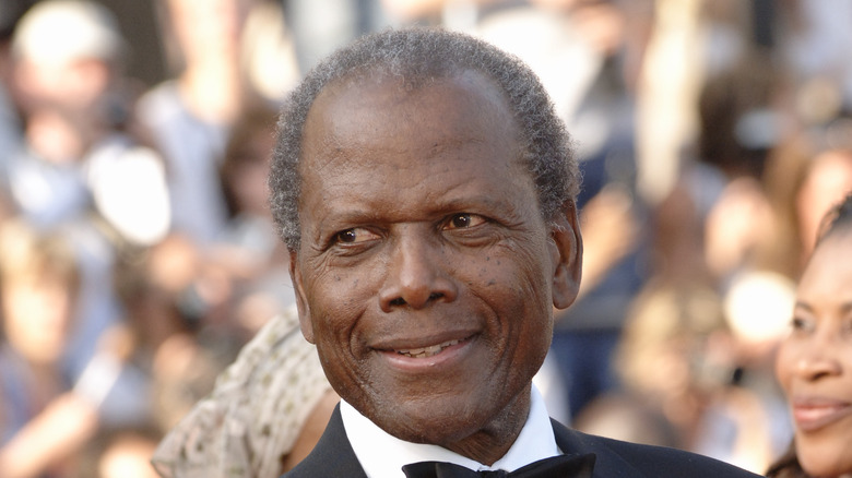 Sidney Poitier smiling in tux