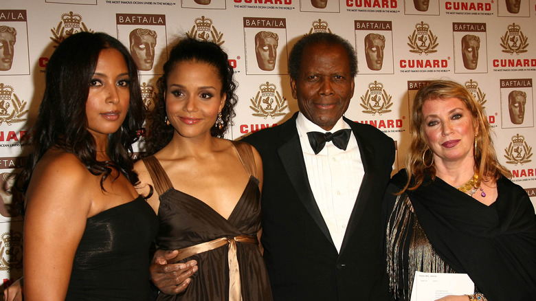 Sidney Poitier with two of his daughters and his current wife, in 2006