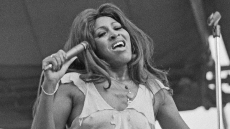 Tina Turner singing.