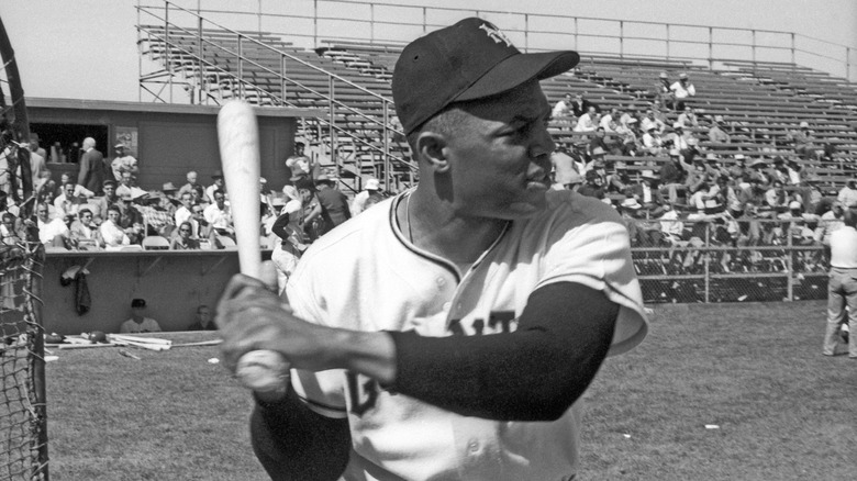 Willie Mays holding baseball bat